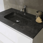 black ceramic sink with stainless steel faucet